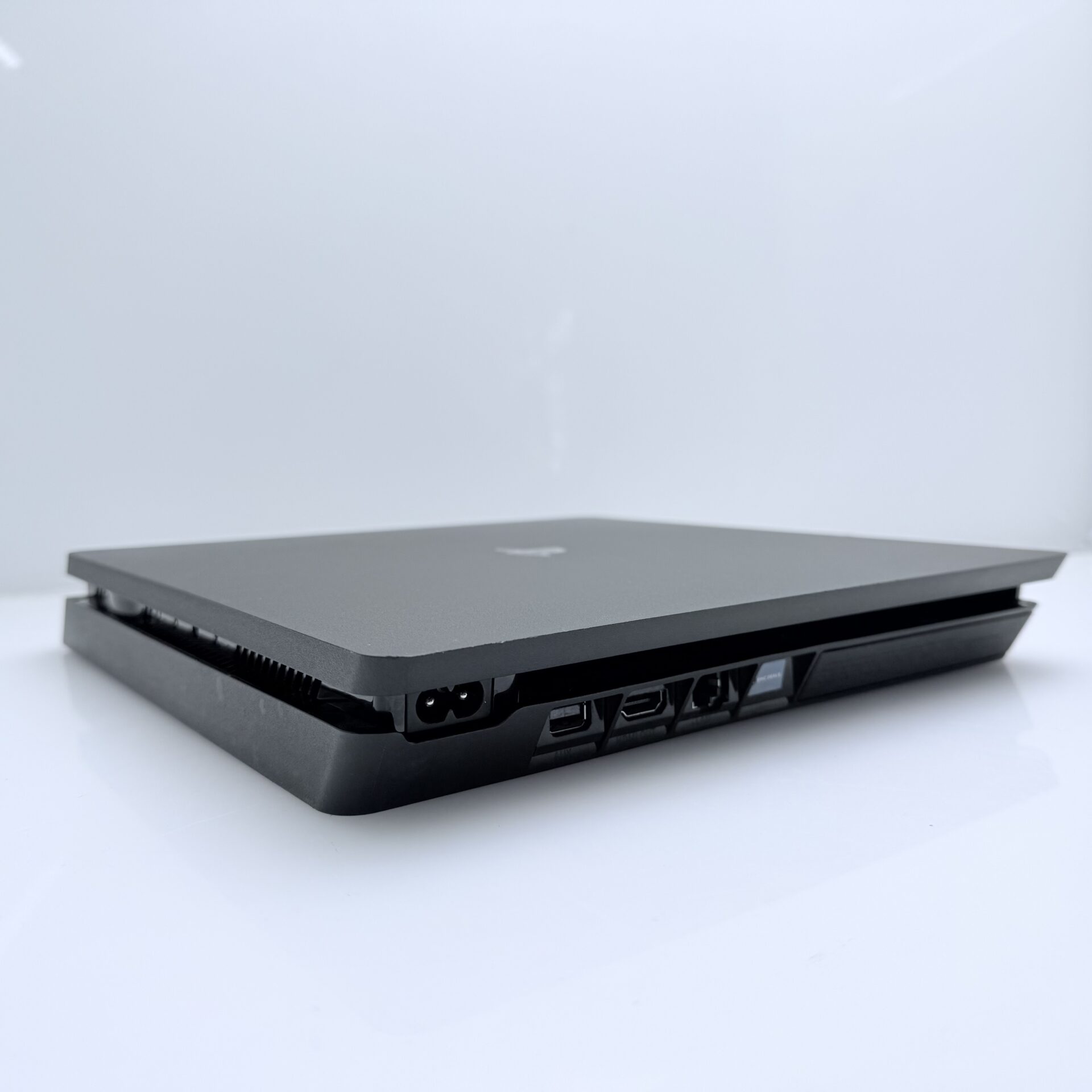 PlayStation 4 Slim Black 500GB + HDMI Cable + Power Cable + 2 Games + 2 Controllers (Grade B) - Image 2