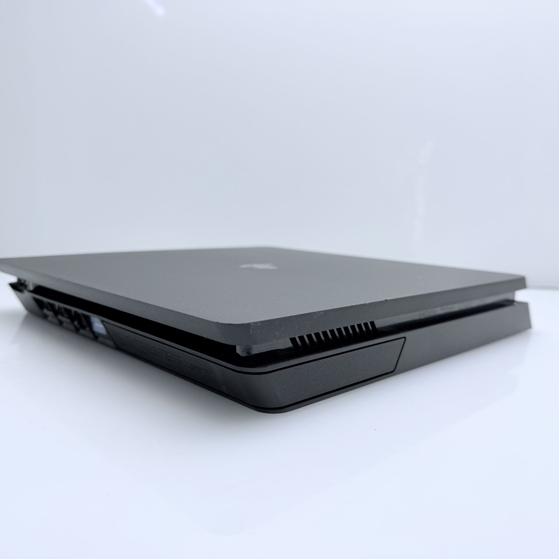 PlayStation 4 Slim Black 500GB + HDMI Cable + Power Cable + 2 Games + 2 Controllers (Grade B) - Image 4