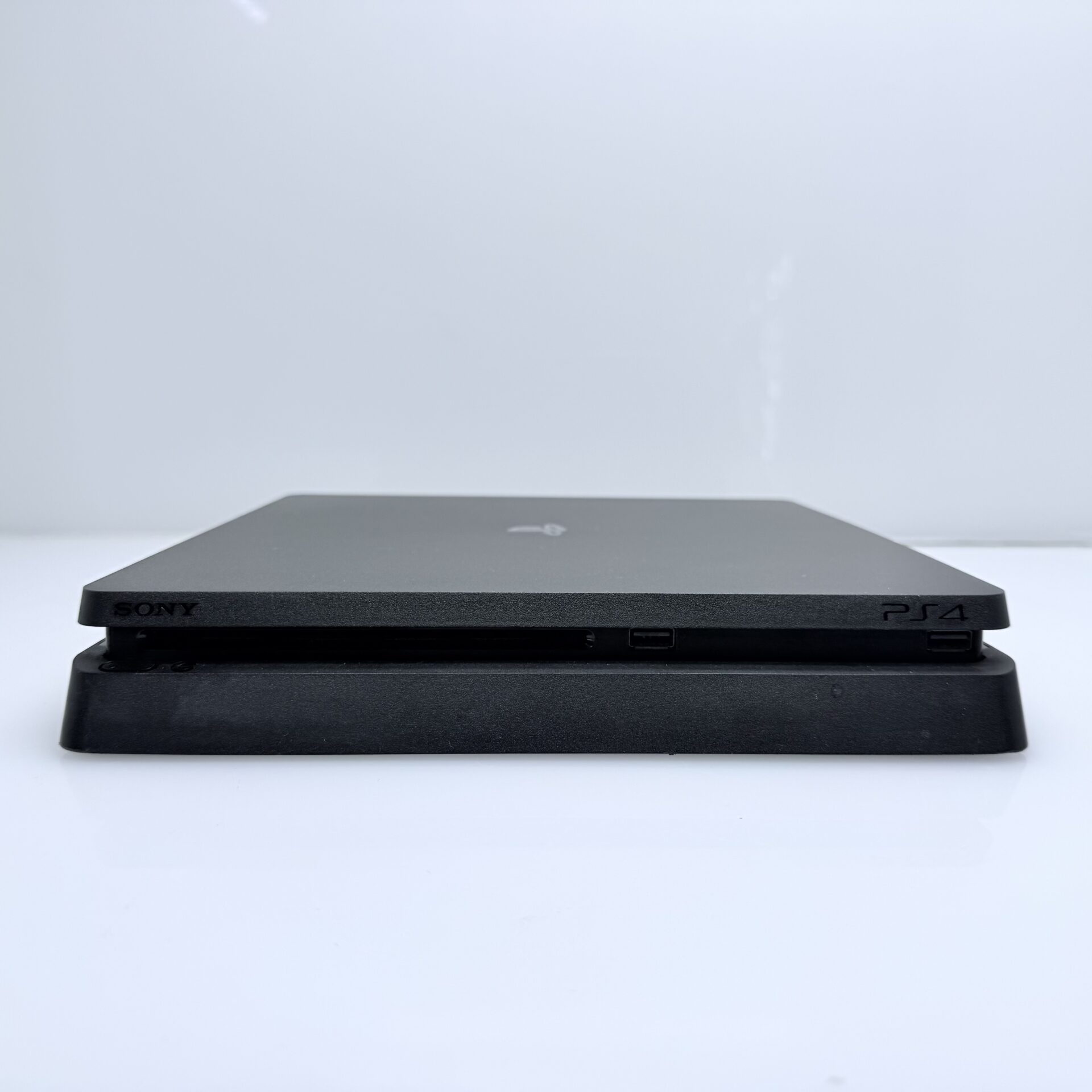 PlayStation 4 Slim Black 500GB + HDMI Cable + Power Cable + 2 Games + 2 Controllers (Grade B) - Image 6