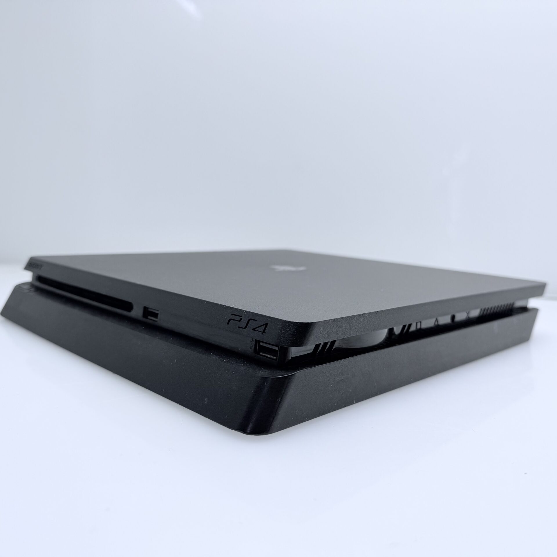 PlayStation 4 Slim Black 500GB + HDMI Cable + Power Cable + 2 Games + 2 Controllers (Grade B) - Image 7